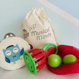 Instrument pack with tambourine, cage bell, scarf and bag