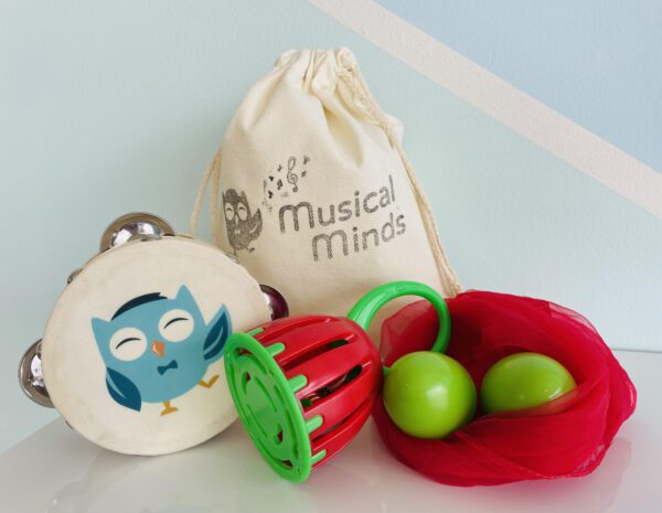 Instrument pack with tambourine, cage bell, scarf and bag