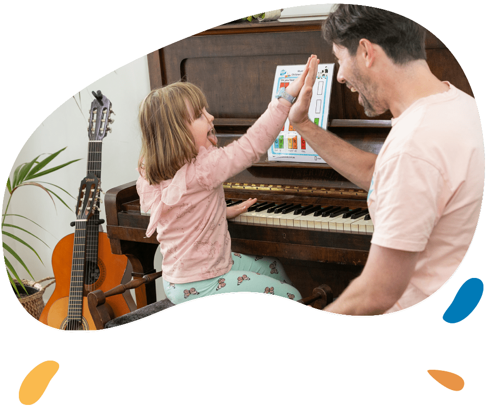 Group Of Students Playing In School Orchestra Together