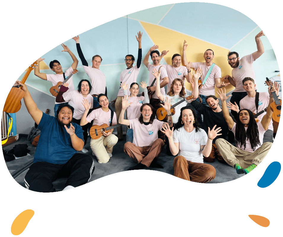 Group Of Pre School Children Taking Part In Music Lesson